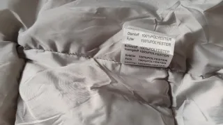 Piumino azzurro taglia S