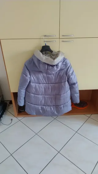 Piumino azzurro taglia S