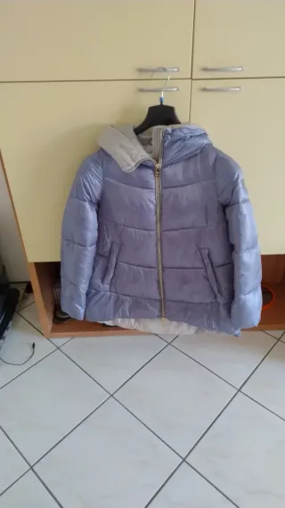 Piumino azzurro taglia S