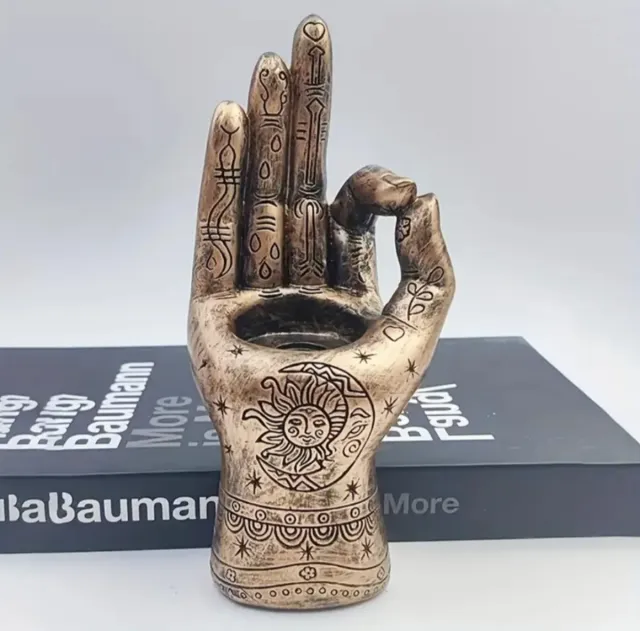 Portavelas "Mano de BUDA" con velas