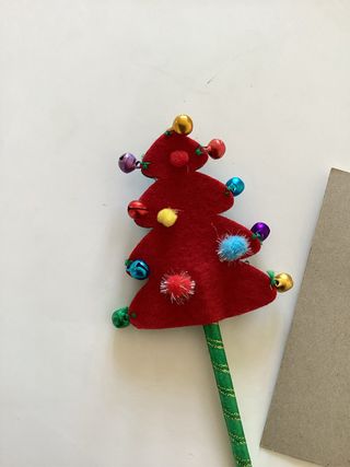 Penna albero di Natale decorata