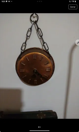 Reloj de pared metal color cobre