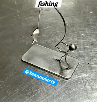 Figura de pesca en acero inoxidable