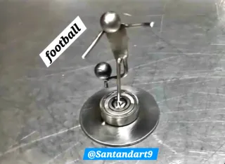 Figura de fútbol en acero inoxidable