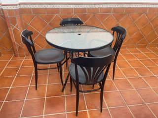 Mesa redonda cristal y 4 sillas exterior