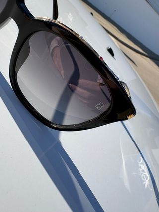 Gafas de sol Tous negras y doradas