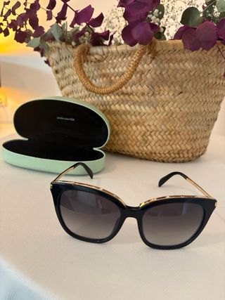 Gafas de sol Tous negras y doradas