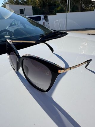 Gafas de sol Tous negras y doradas