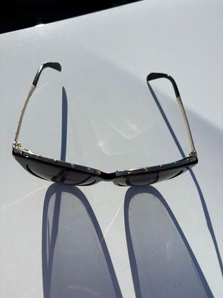 Gafas de sol Tous negras y doradas