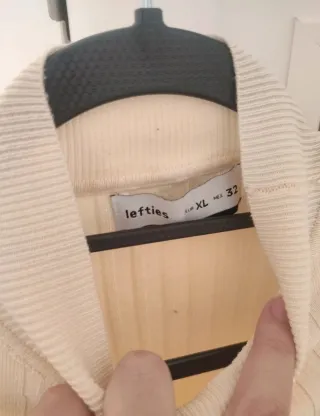 Jersey canalé cuello alto mujer beige