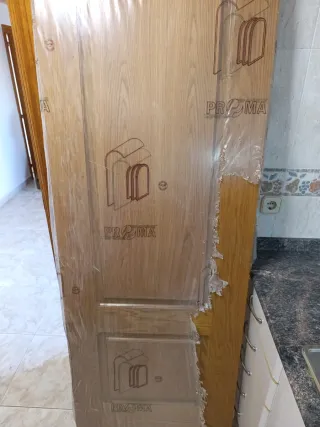Puertas y tapetas de madera