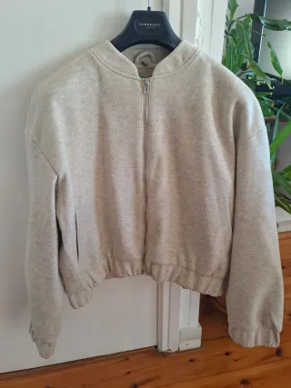 Bomber lana beige y negra