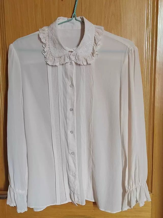 Camicetta bianca trasparente con rouches