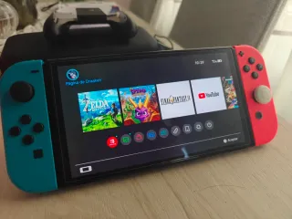 Nintendo Switch OLED Roja/Azul + Funda y protector