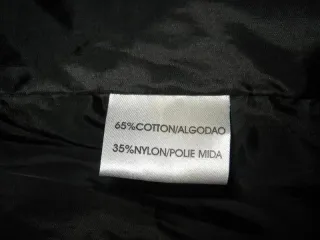 Abrigo negro sintético T. L