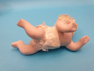 bambola bambolina in ceramica