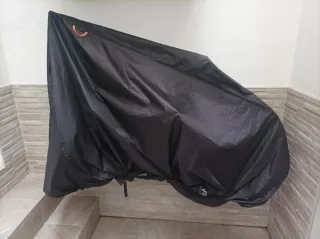 Bicicleta Montaña 24 con funda y soporte pared