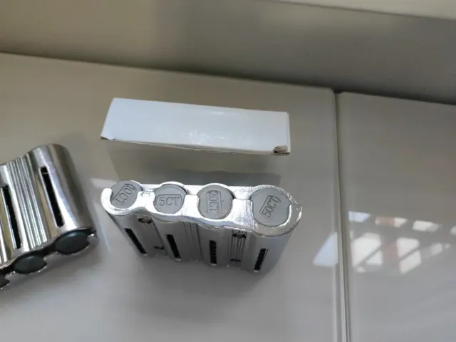 2 Porta-moedas Metálicos Prateados