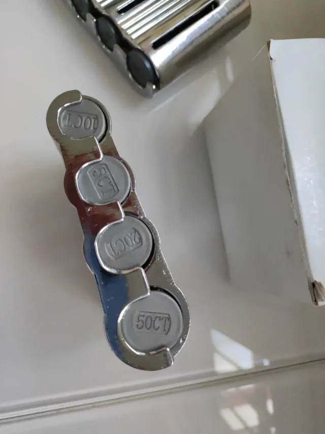 2 Porta-moedas Metálicos Prateados