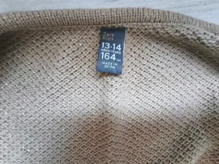 Rebeca dorada con botones