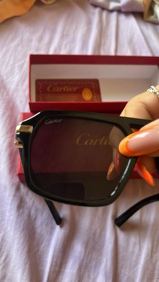 Occhiali da sole Cartier neri e oro