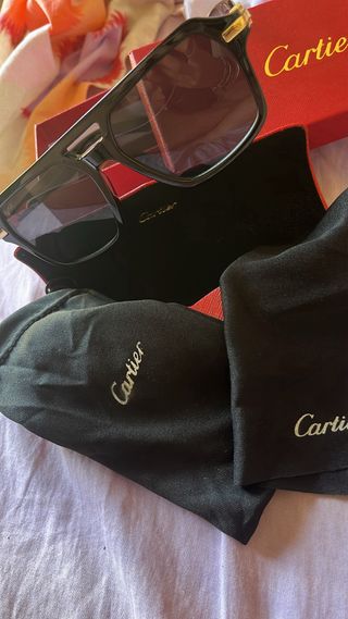 Occhiali da sole Cartier neri e oro