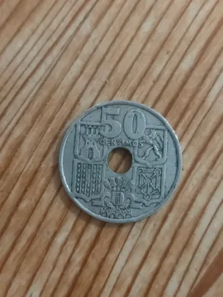 Moneda 50 céntimos flechas invertidas