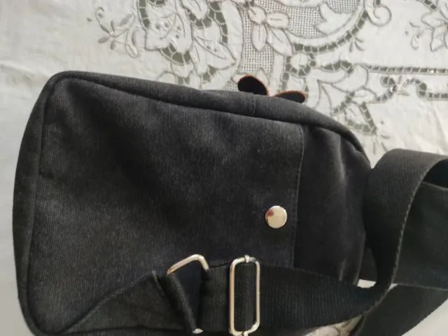 Borsello unisex con tasche