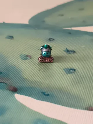 Unicornio de plata y turquesa