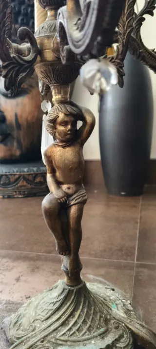 Antichi candelabri in bronzo e cristallo