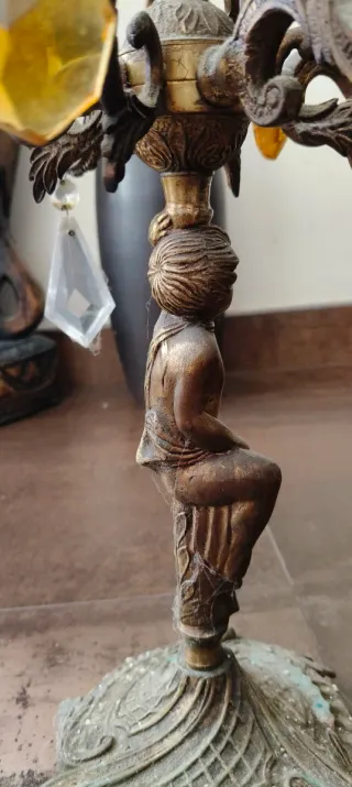 Antichi candelabri in bronzo e cristallo