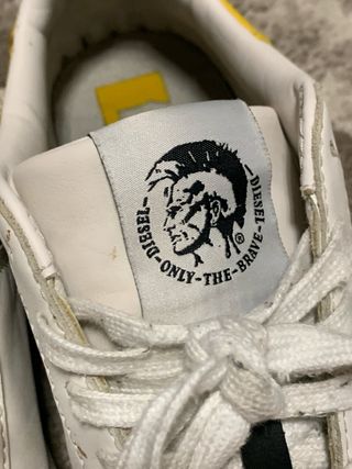 Scarpe Diesel bianche con dettagli gialli