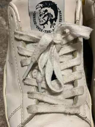 Scarpe Diesel bianche con dettagli gialli