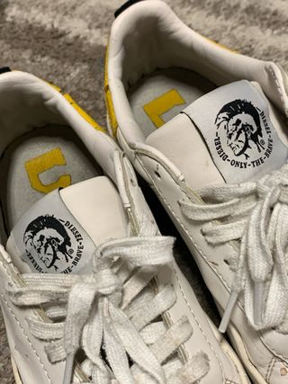 Scarpe Diesel bianche con dettagli gialli