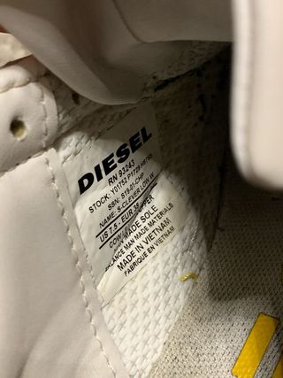 Scarpe Diesel bianche con dettagli gialli