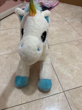 Peluche unicorno bianco arcobaleno