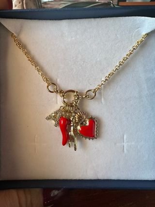 Collana con ciondoli cuore sacro corno