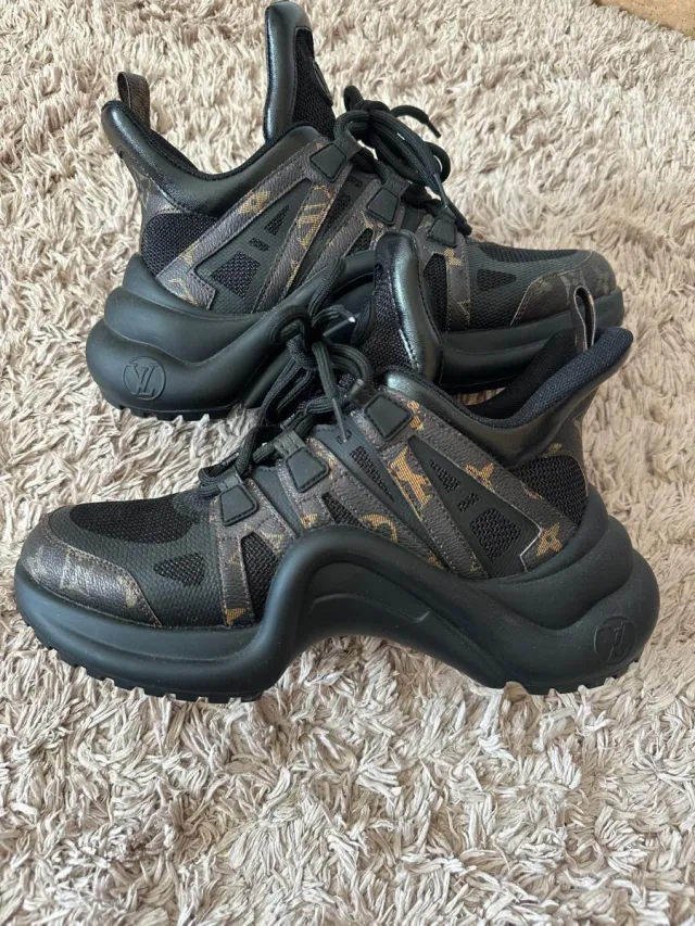 Zapatillas archlight Negras y Marrones