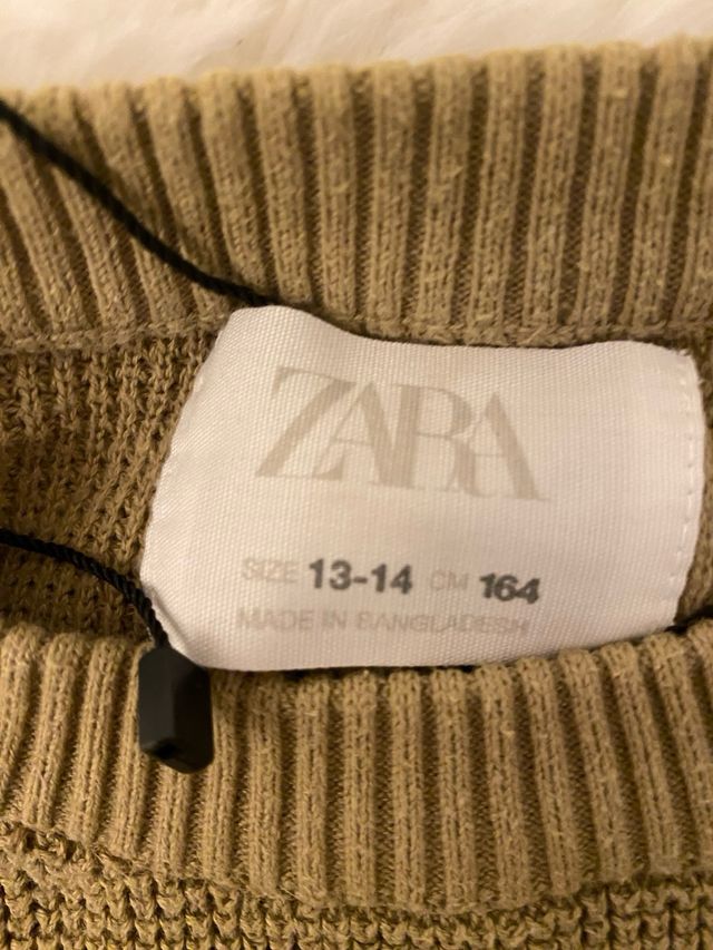 Suéter verde oliva con bolsillo