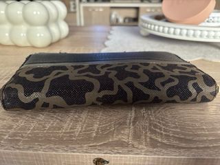 Cartera Tous negra y dorada