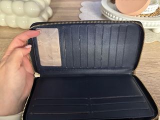 Cartera Tous negra y dorada