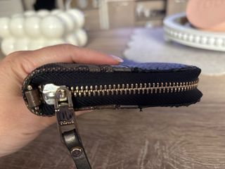 Cartera Tous negra y dorada