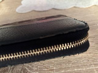 Cartera Tous negra y dorada