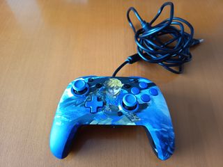 Nintendo Switch OLED + funda + 5 juegos