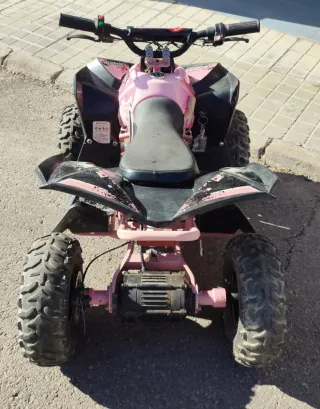 Quad eléctrico rosa 1060W 48V