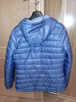 Cazadora Neak Peak azul de mujer.