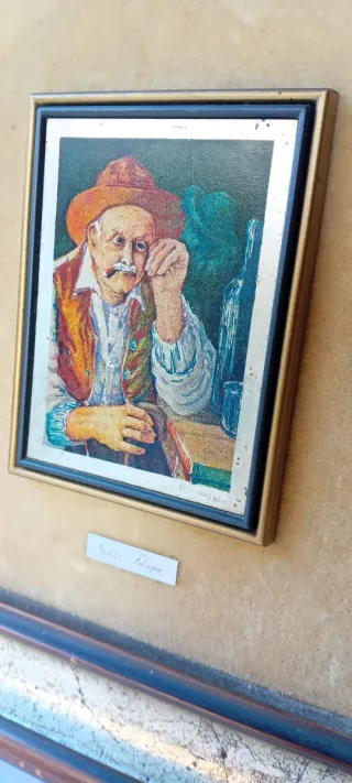 Quadro con cornice dorata