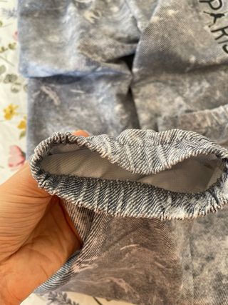 Pantaloni grigi effetto marmo