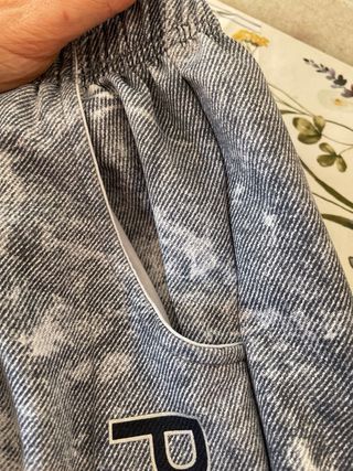 Pantaloni grigi effetto marmo