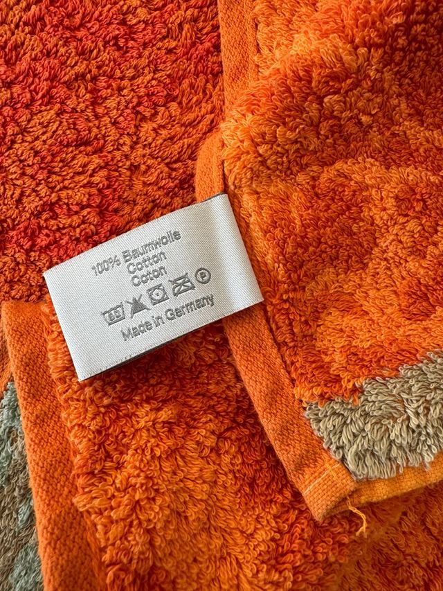 Asciugamani Joop! arancioni e turchesi